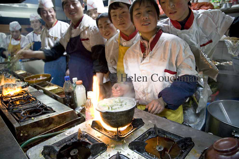T2496x1664-05924 young cooks in a Lanzhou kitchen Gansu China © Helen Couchman